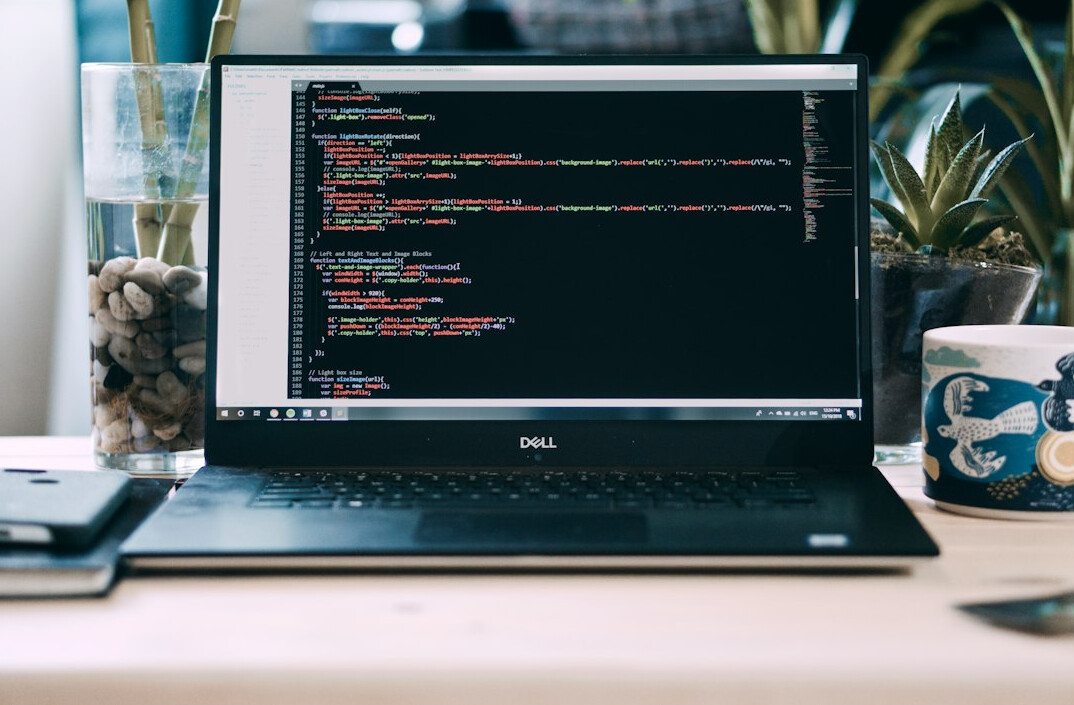 coding on laptop